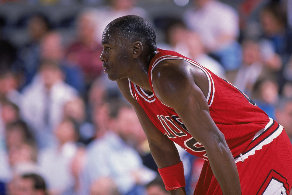 1988: Michael Jordan #23 of the Chicago Bulls rests on the court during a game. NOTE TO USER: User expressly acknowledges and agrees that, by downloading and/or using this Photograph, User is consenting to the terms and conditions of the Getty Images License Agreement. Mandatory copyright notice: Copyright 2001 NBAE Mandatory Credit:  Mike Powelll/Allsport