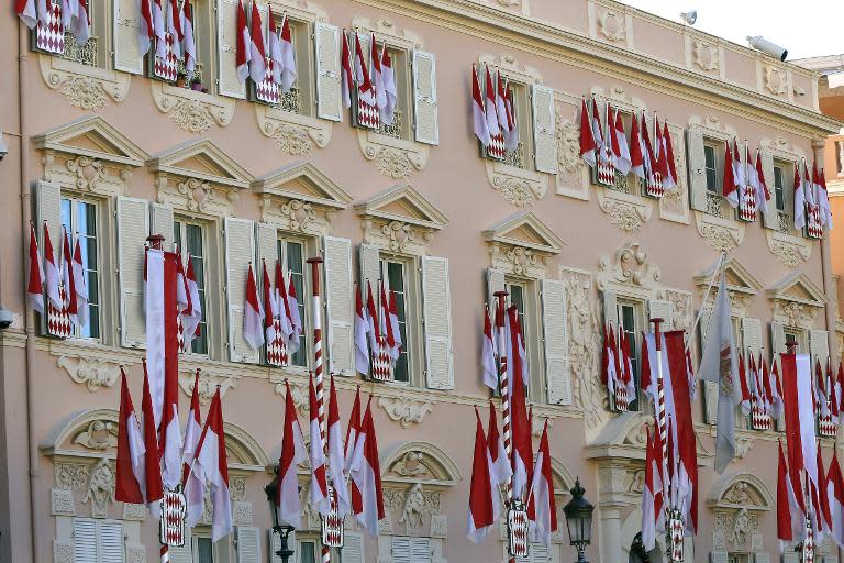 Palace of Monaco is adorned with flags on December 11, 2014 to mark the birth of baby twins to Prince Albert II and Princess Charlene