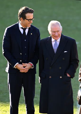 <p>Getty Images</p> Ryan Reynolds meets King Charles in North Wales.