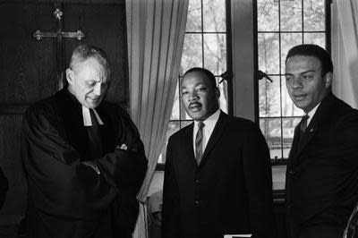 U.S. clergyman and civil rights leader Martin Luther King (center) speaks with U.S. Pastor Martin Sargent (left) of the American Church of Paris on Sunday, Oct. 24, 1965 in Paris, after preaching at the service. During the march of Wednesday, Aug. 28, 1963, Martin Luther King delivered his historic "I Have a Dream" speech in which he called for an end to racism, and which mobilized supporters of desegregation and prompted the Civil Rights Act of 1964. He was assassinated on Thursday, April 4, 1968 in Memphis, Tennessee and his killing sent shock waves through American society at the time, and is still regarded as a landmark event in recent U.S. history.