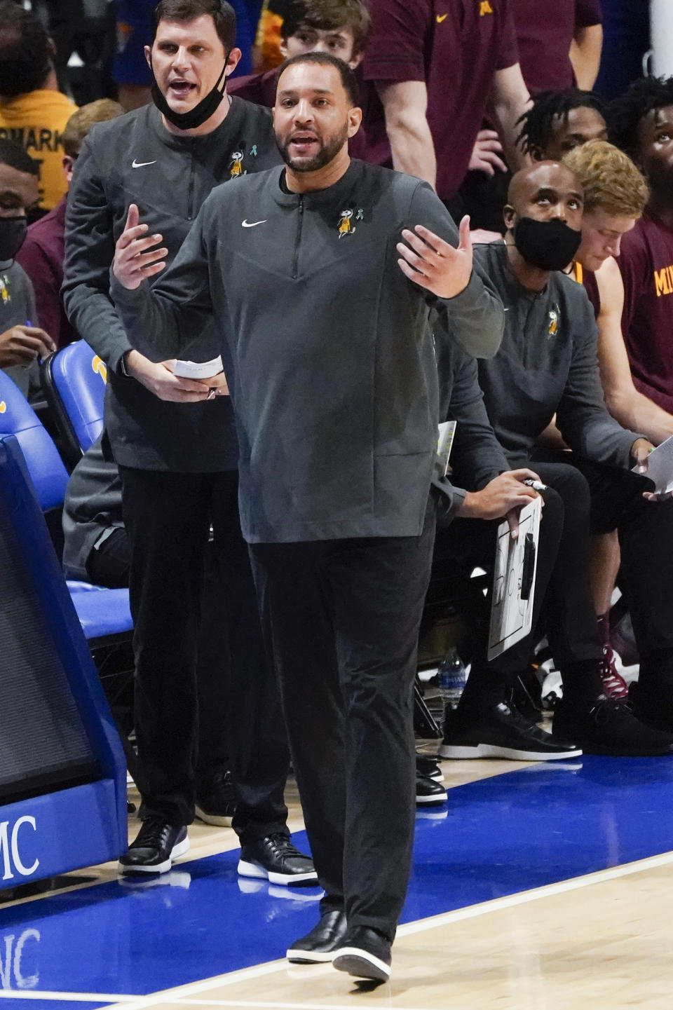 Minnesota coach Ben Johnson pleads to an official during the second half of the team's NCAA college basketball game against Pittsburgh, Tuesday, Nov. 30, 2021, in Pittsburgh. Minnesota won 54-53. (AP Photo/Keith Srakocic)