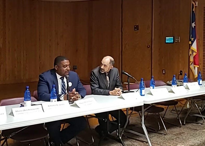 Fayetteville Mayor Mitch Colvin, left, and Freddie de la Cruz, participate in a candidates forum on Sunday, June 12, 2022, at the Headquarters Library. The two men are competing for the mayor's job.