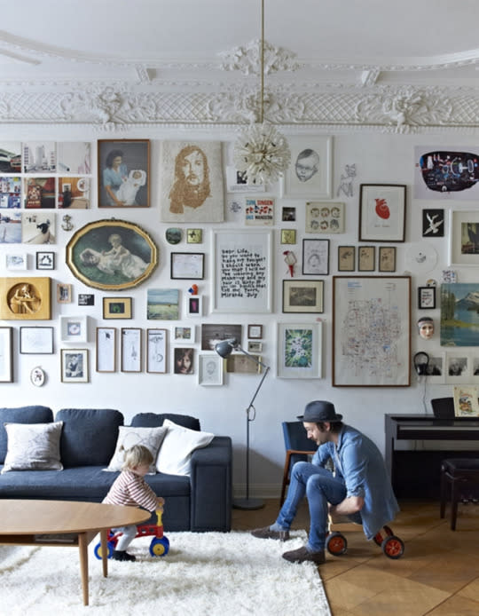 <p>Ditch the fancy schmancy artwork for room to show off your favorite people.</p><p>Don’t get me wrong, a statement piece of art has its place in your home. But don’t be afraid to mix an expensive painting on your wall with mementos of your crazy, messy, loving family. “A standard of professional perfection can keep us from filling our home with snapshots of everyday life,” says <a href="http://darlingmagazine.org/making-your-house-a-home/" rel="nofollow noopener" target="_blank" data-ylk="slk:Nicole Zasowski;elm:context_link;itc:0;sec:content-canvas" class="link ">Nicole Zasowski</a>, a family a marriage therapist. “Mixing your professional photos that capture those special occasions in life with more informal photos reflecting special memories is the perfect homey combination!” (Source: Ikea Family Life via <a href="http://www.apartmenttherapy.com/9-gallery-walls-done-right-173044" rel="nofollow noopener" target="_blank" data-ylk="slk:Apartment Therapy;elm:context_link;itc:0;sec:content-canvas" class="link ">Apartment Therapy</a>)</p>