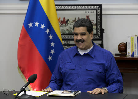 Venezuela's President Nicolas Maduro speaks during a meeting with ministers at Miraflores Palace in Caracas, Venezuela September 12, 2017. Miraflores Palace/Handout via REUTERS