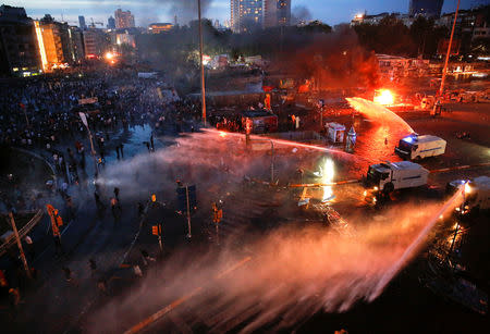 FILE PHOTO: Turkish police use water cannons to disperse protesters at Taksim square in Istanbul, Turkey, June 11, 2013. REUTERS/Yannis Behrakis/