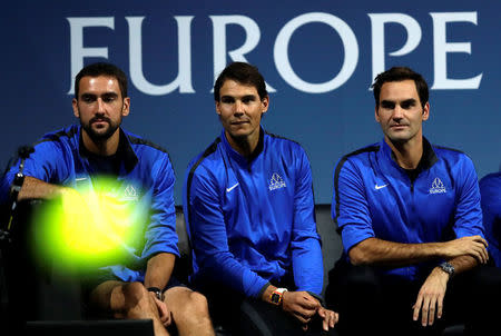 Tennis - Laver Cup - 1st Day - Prague, Czech Republic - September 22, 2017 - Roger Federer, Rafael Nadal and Marin Cilic of team Europe react during the match. REUTERS/David W Cerny