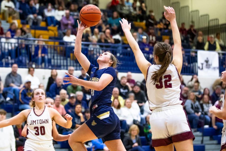 New Prairie's Jayden Flagg (11) drives to the basket during the New Prairie vs. Jimtown girls sectional semifinal basketball game Friday, Feb. 2, 2024 at New Prairie High School.