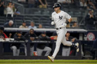 New York Yankees' Joey Gallo runs the bases after hitting a solo home run off Cleveland Indians starting pitcher Zach Plesac during the second inning of a baseball game Friday, Sept. 17, 2021, in New York. (AP Photo/John Minchillo)