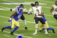 Chicago Bears quarterback Nick Foles (9) is sacked by Los Angeles Rams linebacker Justin Hollins during the second half of an NFL football game Monday, Oct. 26, 2020, in Inglewood, Calif. (AP Photo/Kelvin Kuo)