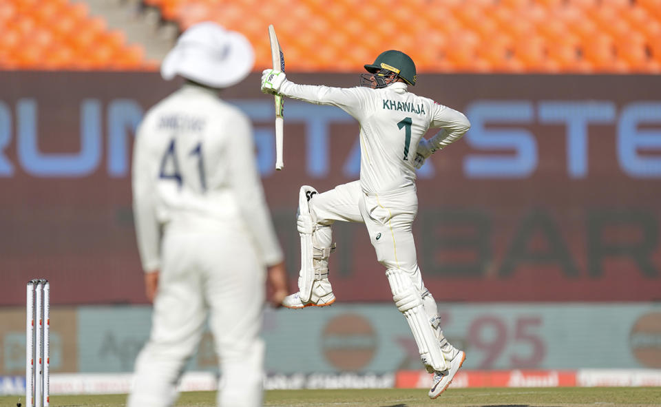 Usman Khawaja, pictured here celebrating after brining up his century in the fourth Test against India.