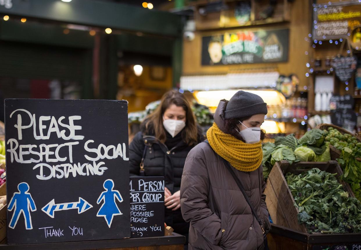 A WHO leader has said social distancing and face mask wearing should continue even when lockdown is lifted. (Tolga Akmen/AFP via Getty Images)