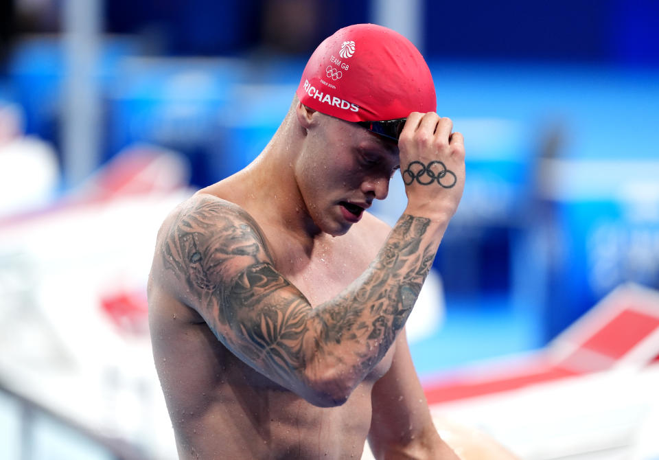 Olympic swimmer Matthew Richards with a tattoo of the Olympic rings on his hand.