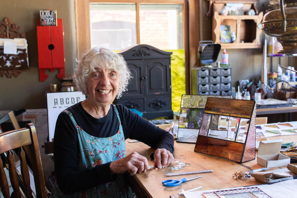 Mary Rose Nichols works on a stained glass project during the Art Harvest Tour on Sunday, Sept. 25, 2022, at Mary Rose Collection in Perry.