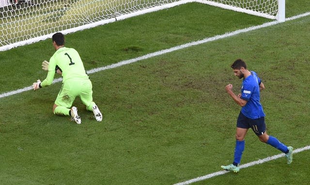 Domenico Berardi, right, celebrates his winner 