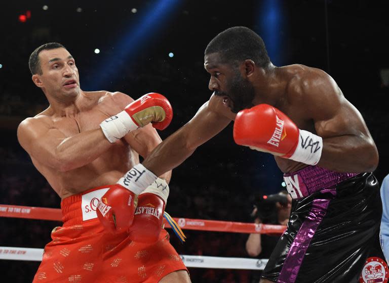 Wladimir Klitschko (L) of Ukraine and Bryant Jennings of the US exchange punches during their World Heavyweight Championship fight, at Madison Square Garden in New York, on April 25, 2015