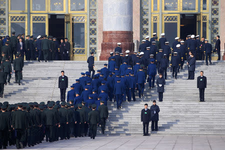 Military delegates arrive at the Great Hall of the People for a meeting ahead of National People's Congress (NPC), China's annual session of parliament, in Beijing, China March 4, 2019. REUTERS/Aly Song