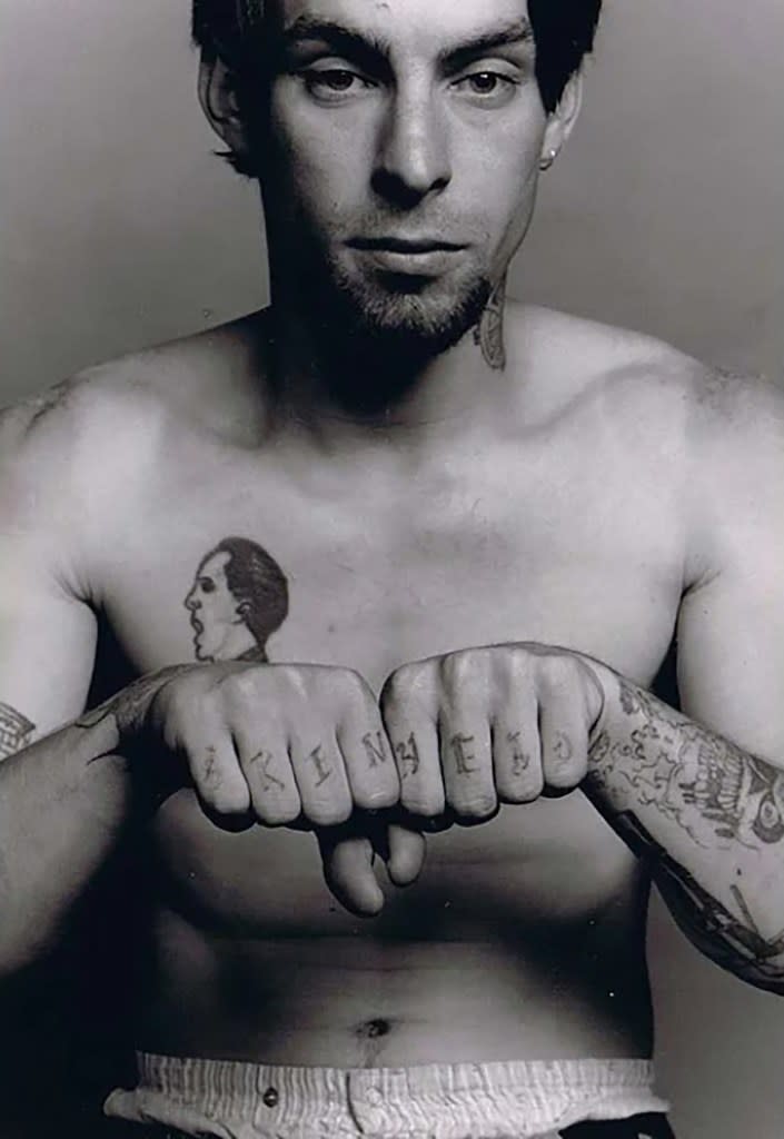 Meeink had these photographs taken just before he had the tattoos removed as a reminder of his hateful past. Frank Meeink