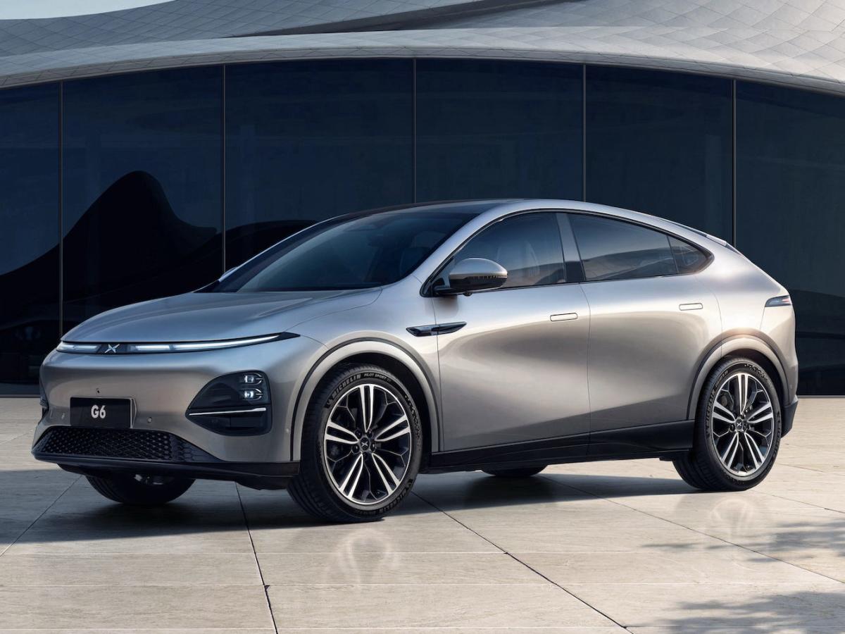 Chinese Tesla rival XPeng just got a $700 million investment from  Volkswagen. Take a look at its quick-charging SUV with more range than the  Model Y.