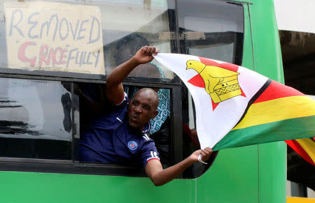 A man calling for Zimbabwean President Robert Mugabe to step down protests in Harare, Zimbabwe November 18, 2017. REUTERS/Philimon Bulawayo