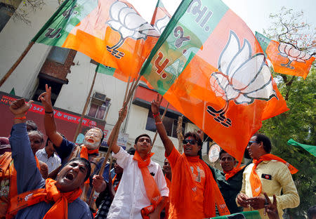 Supporters of Bharatiya Janata Party (BJP) celebrate after learning of initial poll results in Ahmedabad, India, May 23, 2019. REUTERS/Amit Dave