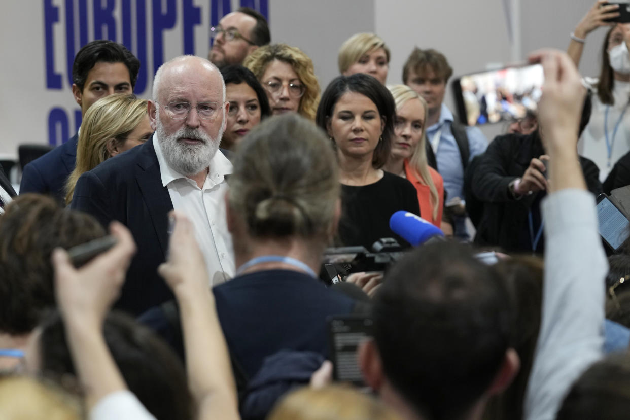 Frans Timmermans, executive vice president of the European Commission, center left, speaks to members of the media at the COP27 U.N. Climate Summit, Saturday, Nov. 19, 2022, in Sharm el-Sheikh, Egypt. (AP Photo/Peter Dejong)