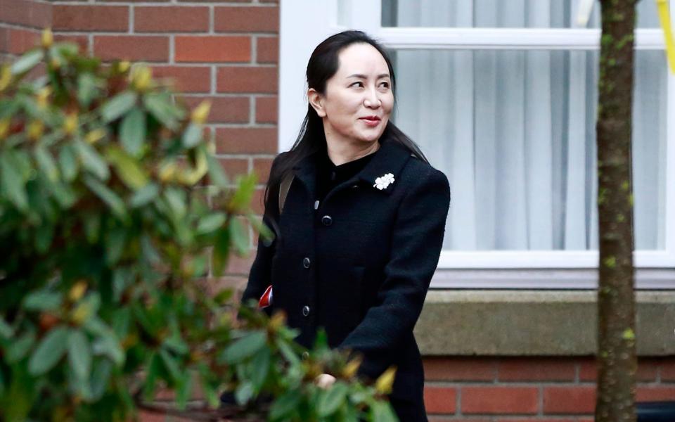 Huawei's chief financial office Meng Wanzhou leaves her house to attend court on Jan 20, 2020 in Vancouver, Canada - Getty Images North America