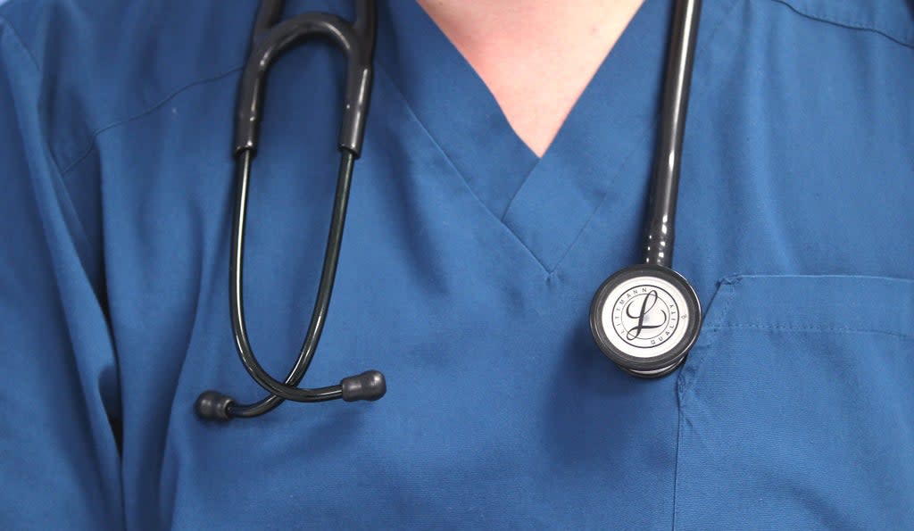 A doctor with a stethoscope (Lynne Cameron/PA) (PA Wire)