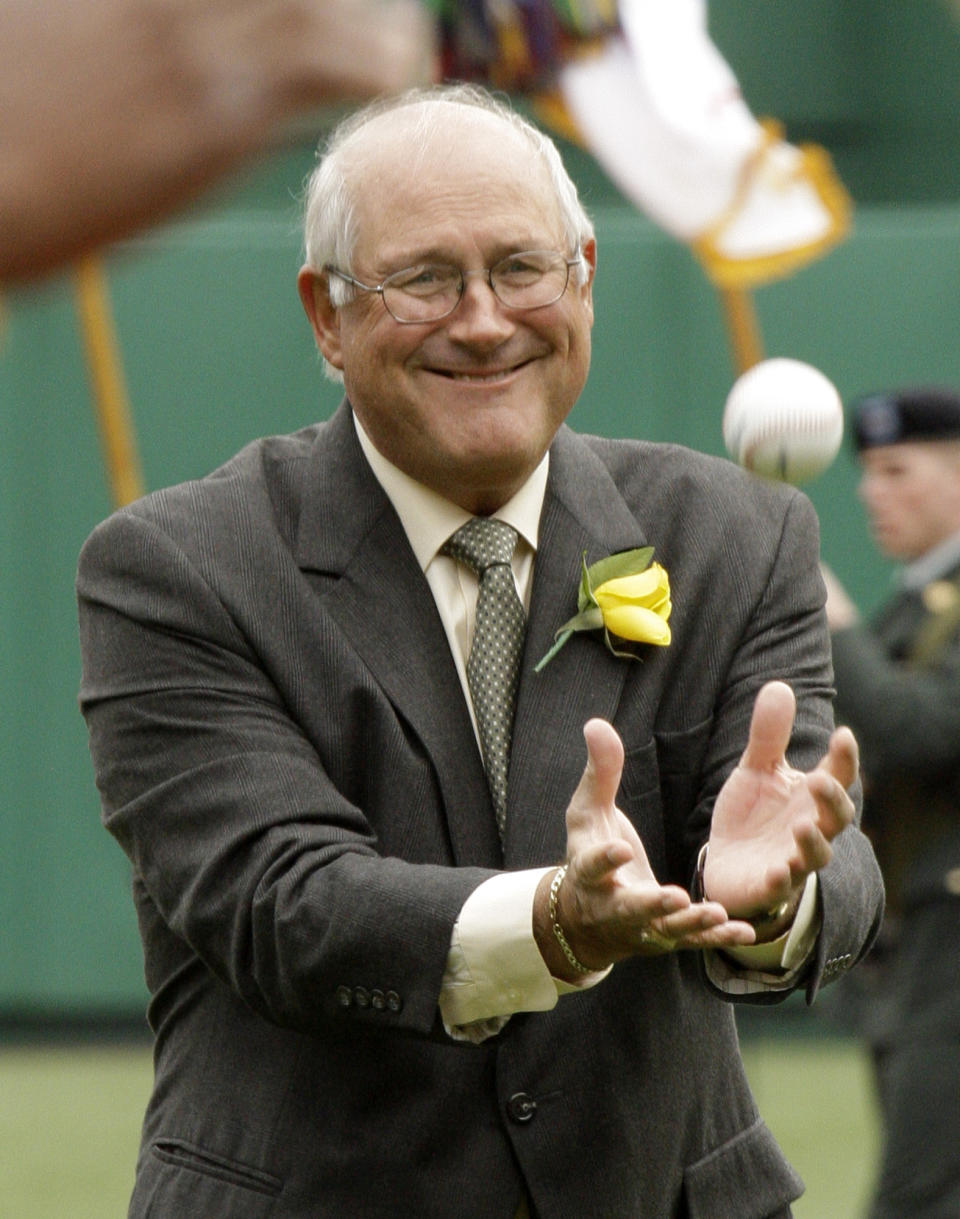 FILE - In this April 13, 2009, file photo, Pittsburgh Pirates broadcaster and former pitcher Steve Blass is honored for his 50 years with the Pirates organization before the Pirates home opener baseball game against the Houston Astros, in Pittsburgh. Blass spent his boyhood afternoons in Connecticut flinging a rubber ball against the side of a half-barn, fantasizing that he was pitching in the majors. Come evening, the 10-year-old would get his radio and tune into a game. (AP Photo/Gene J. Puskar, File)