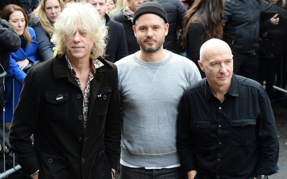 Paul Epworth (centre) with Bob Geldof and Midge Ure, in 2014 - Getty