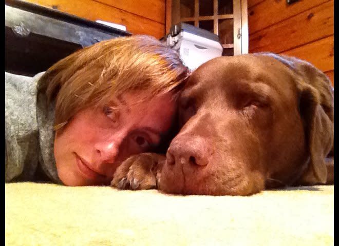 This is me and my main squeeze, Zeus. He's a Chocolate Lab, my best buddy and the guy who saved my life. He's better than a man because he lets me talk just as much as I want and never complains -- even if I tell him a story more than once.