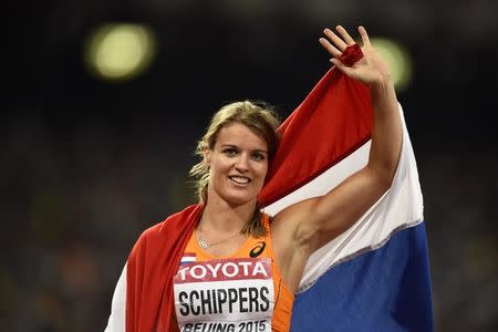 Dafne Schippers of Netherlands celebrates winning the women's 200 metres final during the 15th IAAF World Championships at the National Stadium in Beijing, China August 28, 2015. REUTERS/Dylan Martinez