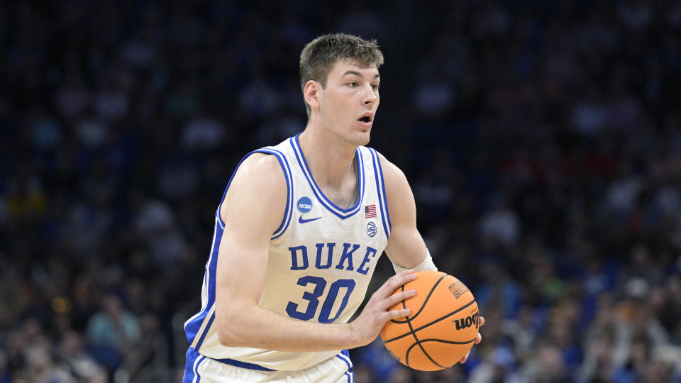 FILE - Duke center Kyle Filipowski (30) during the second half of a first-round college basketball game against Oral Roberts in the NCAA Tournament, March 16, 2023, in Orlando, Fla. The Duke Blue Devils are ranked No. 2 in the preseason AP Top 25. (AP Photo/Phelan M. Ebenhack, File)