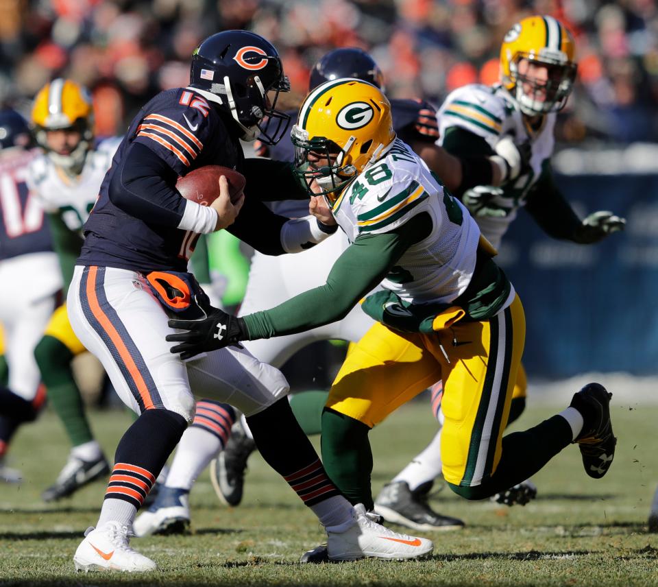 Green Bay Packers' Joe Thomas pressures Chicago Bears' Matt Barkley on Dec. 18, 2016, at Soldier Field in Chicago.