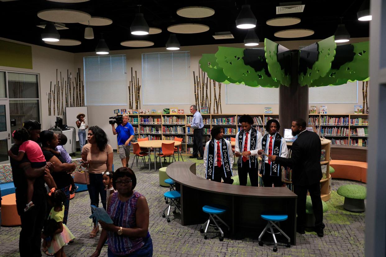 Patrons explore a media center on Aug. 10 at Rutledge H. Pearson Elementary School in Jacksonville. This is the first new school built with the half-penny sales tax Duval County voters approved in 2020 and replaced a deteriorated building of the same name and site.