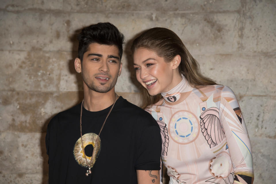 PARIS, FRANCE - OCTOBER 02:  Zayn Malik and Gigi Hadid  attend the Givenchy show as part of the Paris Fashion Week Womenswear Spring/Summer 2017 on October 2, 2016 in Paris, France.  (Photo by Dominique Charriau/WireImage)