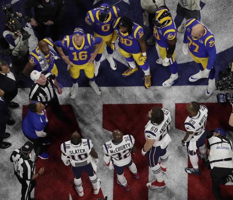 Referee John Parry and players watch the coin toss before Super Bowl LIII. (AP Photo/Morry Gash)