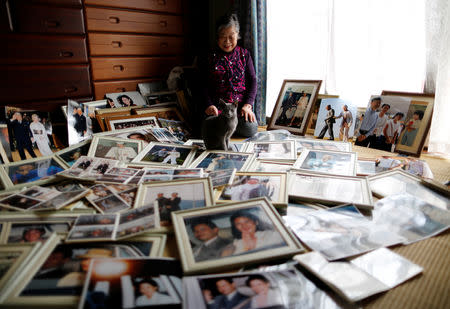 Royal aficionado Fumiko Shirataki, 78, displays her collection of photographs of royal family members at her home in Kawasaki, Japan, February 21, 2019. REUTERS/Issei Kato