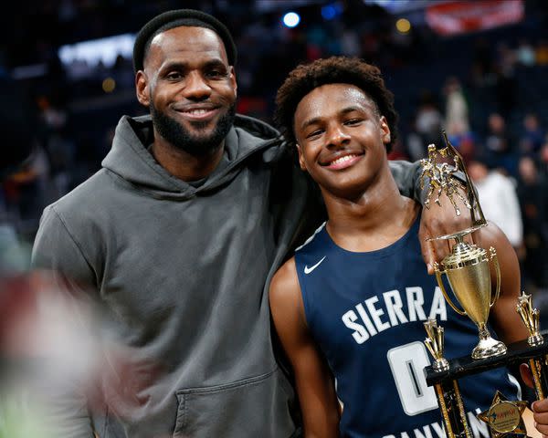 <p>Jay LaPrete/AP</p> From Left: LeBron James and son Bronny