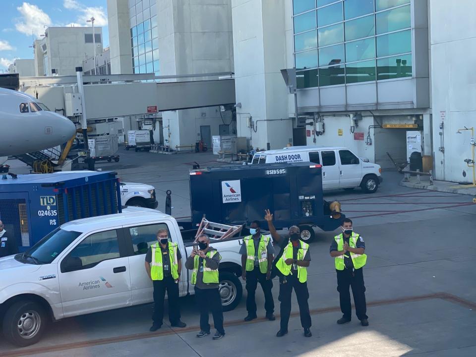 The Miami ground crew before takeoff.