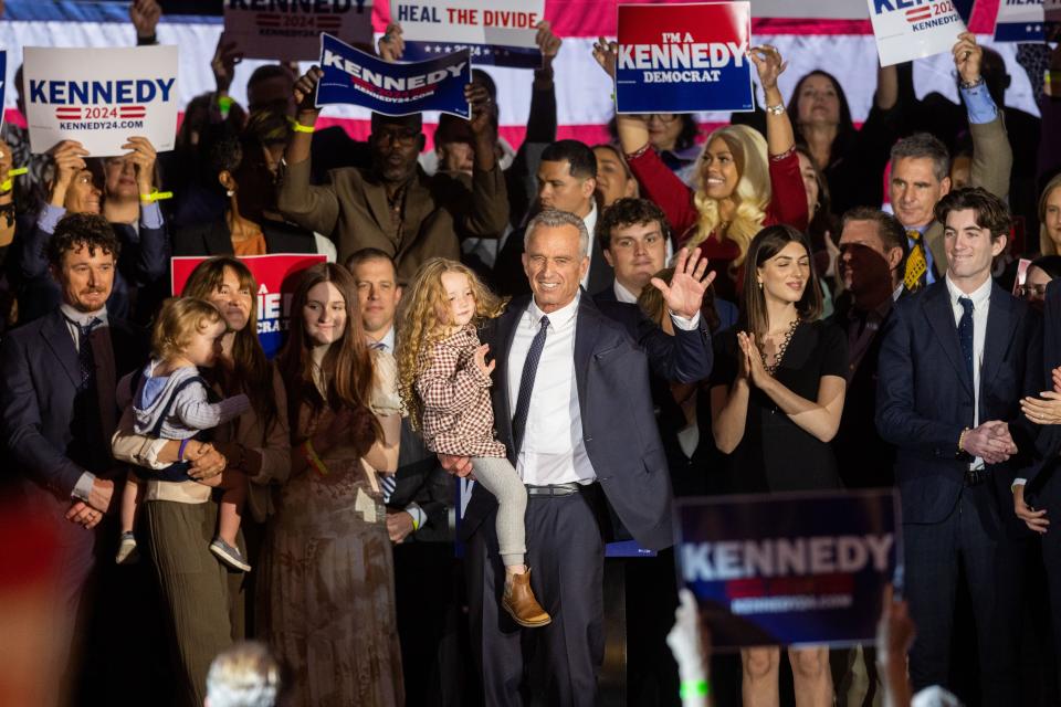 Robert F. Kennedy Jr. is joined by family and supporters on stage after announcing his candidacy for President on April 19, 2023 in Boston, Massachusetts.