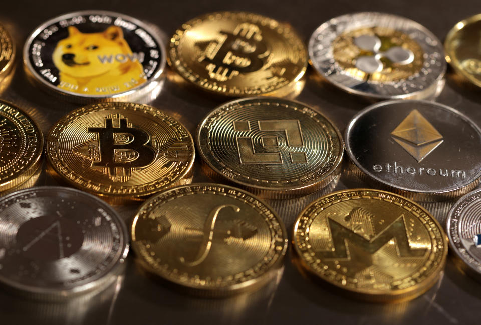 crypto Representations of cryptocurrencies are seen in this illustration, August 10, 2022. REUTERS/Dado Ruvic/Illustration