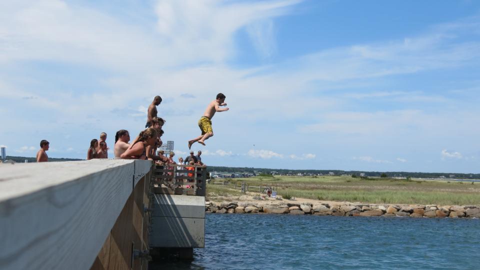 Jumping off the "Jaws Bridge" in Edgartown on Martha's Vineyard is a common summertime practice, in a file photo from 2014.