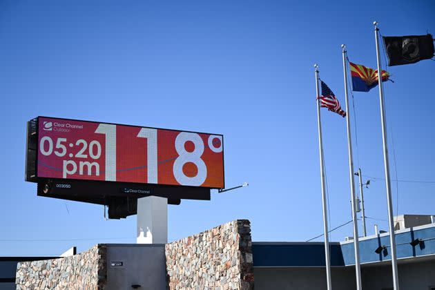 A billboard displays a temperature of 118 degrees Fahrenheit during a record heat wave in Phoenix on July 18.