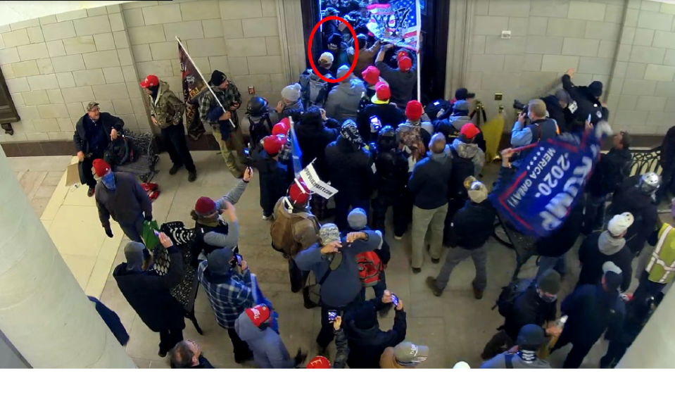 Surveillance video from the U.S. Capitol shows Nancy Barron, circled in red, enter the Capitol building at
approximately 2:38 p.m. through the East Rotunda doors on Jan. 6, 2021, according to a criminal complaint filed in the United States District Court for the District of Columbia.