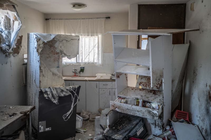 Damage is seen in a building after a rocket from Lebanon hit a house in Safed. Ilia Yefimovich/dpa