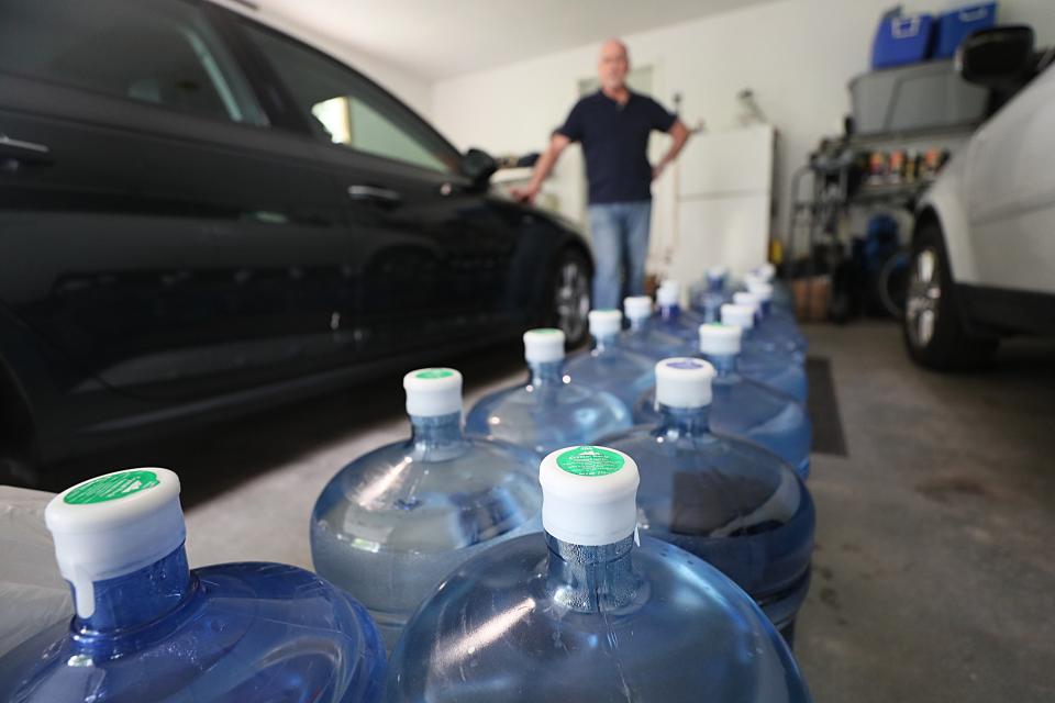 File: Westminster, MA - June 24: This man is part of one of the 200 families who have had some of the highest PFAS levels detected in their drinking water. They now get deliveries of water.