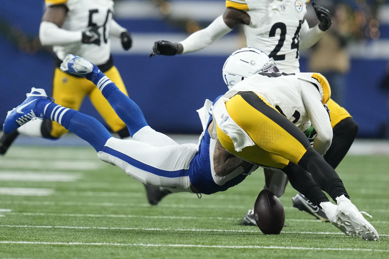 Indianapolis Colts wide receiver Michael Pittman Jr., left, is hit by Pittsburgh Steelers safety Damontae Kazee, right, during the first half of an NFL football game in Indianapolis Saturday, Dec. 16, 2023. Pittman was injured on the play and Kazee was ejected from the game. (AP Photo/Michael Conroy)