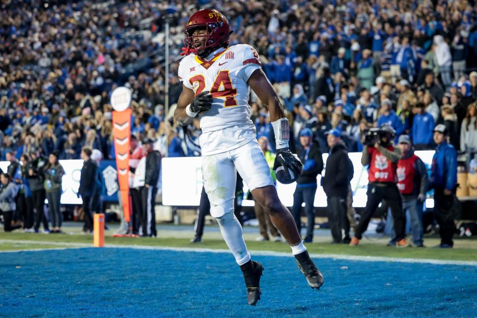 Iowa State Cyclones running back Abu Sama III (24) celebrates after running the ball for a touchdown, putting the Cyclones up 31-7 after the PAT, during the game against the BYU Cougars at LaVell Edwards Stadium in Provo on Saturday, Nov. 11, 2023. | Spenser Heaps, Deseret News