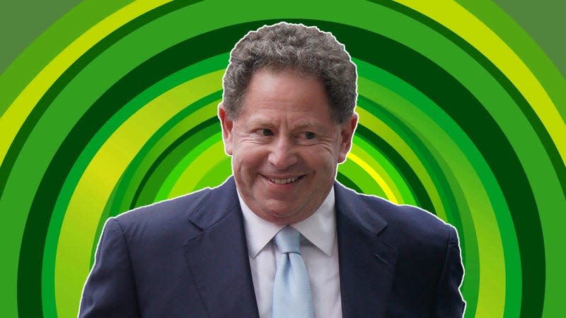 Bobby Kotick stands in front of an Xbox background. 