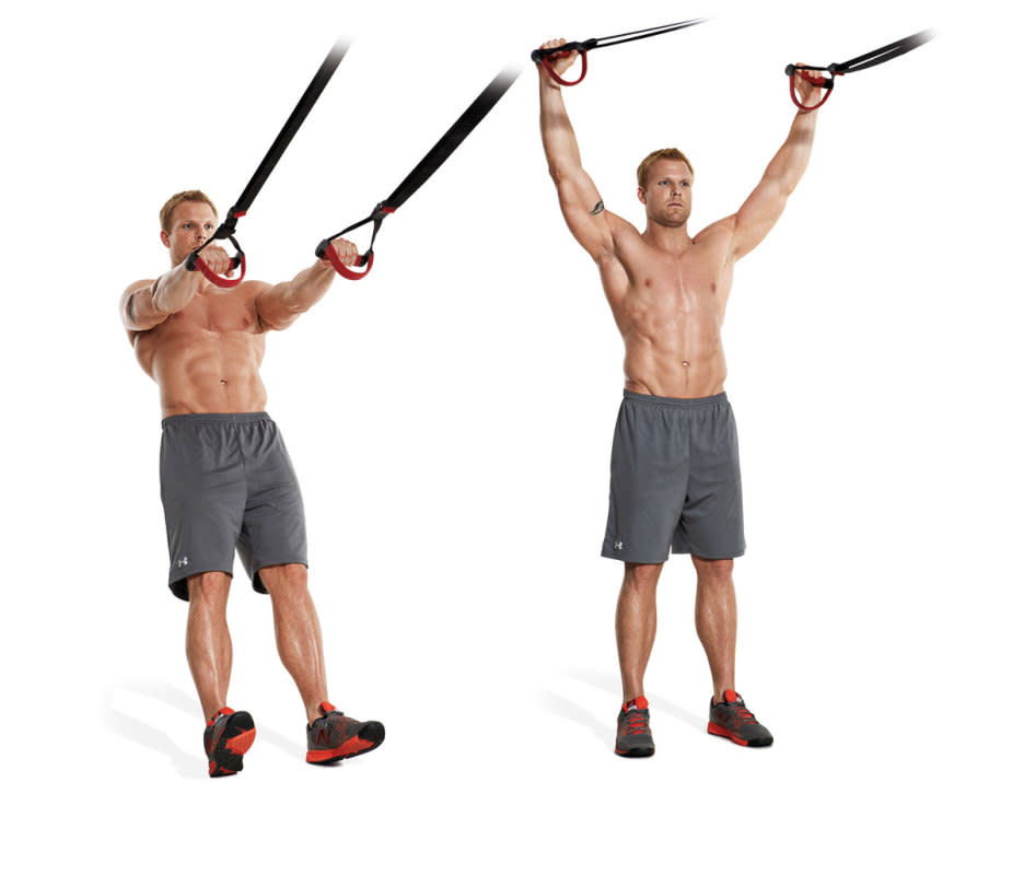 How to do it:<ul><li>Grasp the handles and stand with feet about shoulder width.</li><li>Lean back 45–60 degrees, so your body is supported by the <a href="https://www.muscleandfitness.com/training/workout-routines/the-best-suspension-trainer-ab-workout" rel="nofollow noopener" target="_blank" data-ylk="slk:suspension trainer;elm:context_link;itc:0;sec:content-canvas" class="link ">suspension trainer</a>, and brace your abs.</li><li>Raise your arms up and out into a Y shape with palms facing forward.</li><li>Your body will become more vertical, but don’t allow your shoulders to lose tension at the top of the movement.</li><li>Your weight will shift from the back foot to the front foot.</li><li>Want to try this one at home? <a href="https://www.amazon.com/Resistance-Training-Exercise-Equipment-Suspension/dp/B0BBV3PHVJ?&linkCode=ll1&tag=arena_mensjournal_amazonoutletsaleckulzer0323-20&linkId=45798c34519b4942b7fc3b572f0f3507&language=en_US&ref_=as_li_ss_tl" rel="nofollow noopener" target="_blank" data-ylk="slk:This Amazon resistance training kit can be attached to a door;elm:context_link;itc:0;sec:content-canvas" class="link ">This Amazon resistance training kit can be attached to a door</a>.</li></ul>